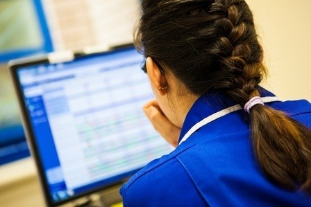 Picture of a nurse looking at a screen